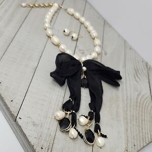 Elegant Pearl and Black Ribbon Necklace